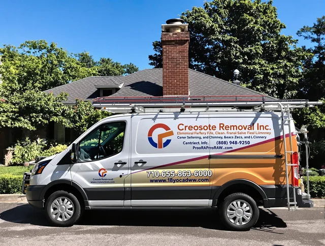 Abington Chimney Sweep technician removing creosote safely in Abington, MA